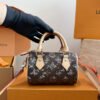 Louis Vuitton Brown Monogram Mini Handbag — 16 cm — view 1