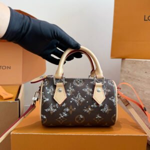 Louis Vuitton Brown Monogram Mini Handbag — 16 cm — view 1 Louis Vuitton Brown Monogram Mini Handbag — 16 cm — view 1