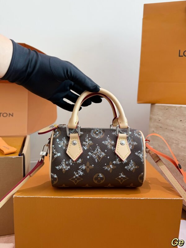 Louis Vuitton Brown Monogram Mini Handbag — 16 cm — view 1