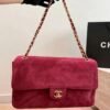 CHANEL Maxi Textured Leather Flap Bag — view 1