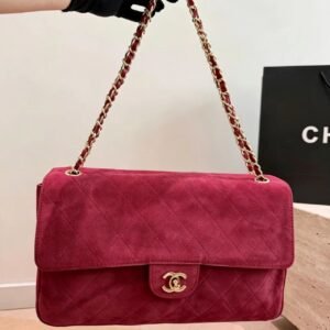 CHANEL Maxi Textured Leather Flap Bag — view 1