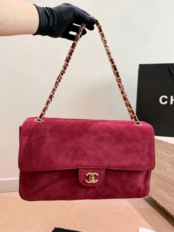 CHANEL Maxi Textured Leather Flap Bag — view 1