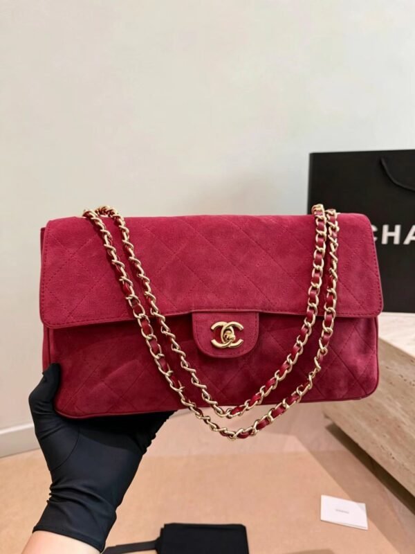 CHANEL Maxi Textured Leather Flap Bag — view 2