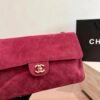 CHANEL Maxi Textured Leather Flap Bag — view 3