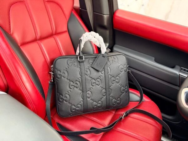 Gucci GG Embossed Top-Handle Bag — view 1