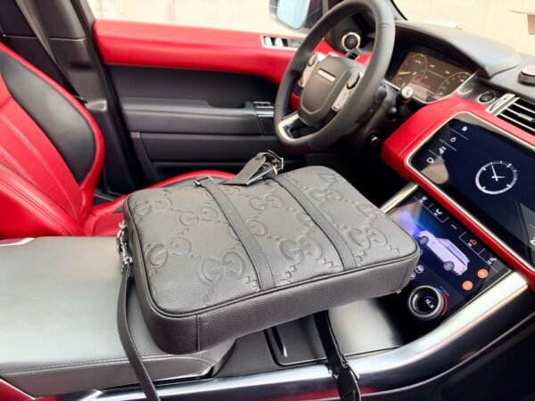 Gucci GG Embossed Top-Handle Bag — view 8